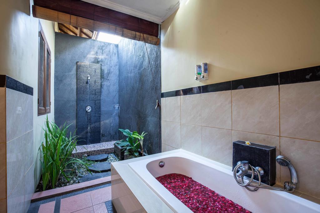 Putri Bali Villa Семіньяк Номер фото