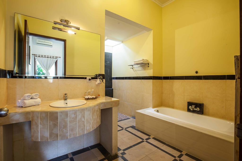 Putri Bali Villa Семіньяк Номер фото